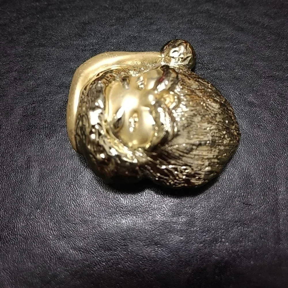Gold tone vintage Santa Claus brooch
